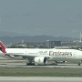 Emirates - Boeing 777-21HLR - A6-EWD<br />BCN - Terminal 1 Gate B67 - 29.8.2023 - 15:52