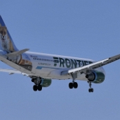 Frontier Airlines - Airbus A320-214(WL) - N229FR  "Peachy the Fox"
SAN - W Laurel St - 8.10.2023 - 12:15 PM